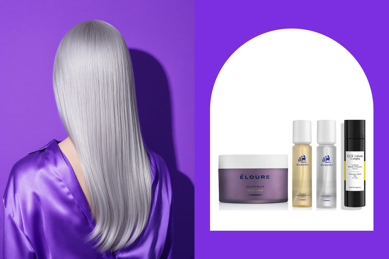 Long, sleek platinum-silver hair seen from behind against a vivid violet backdrop.